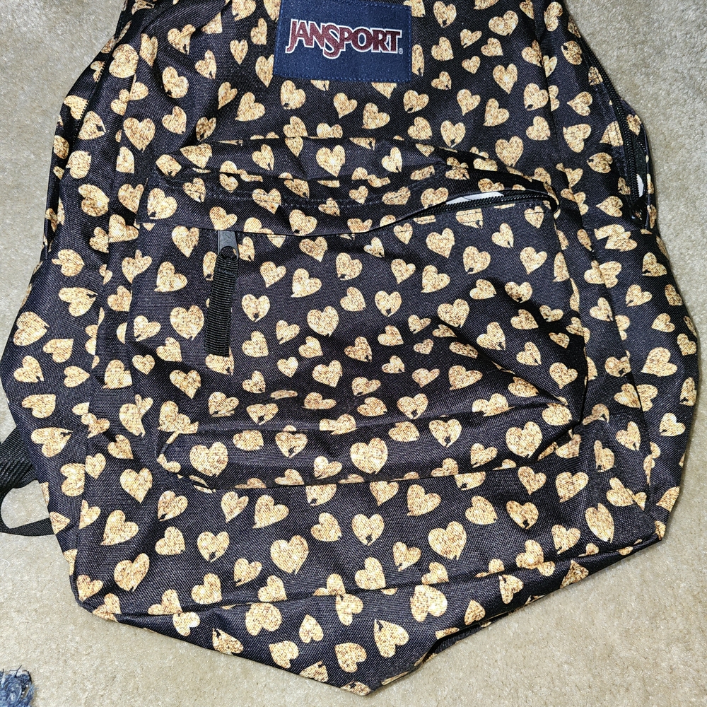 Jansport Black Backpack with Gold Heart Pattern